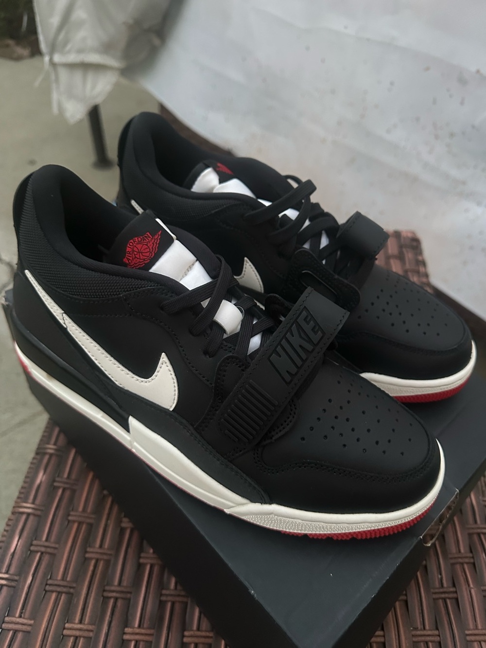 Nike Black and White Sneakers with Red Details